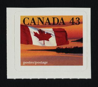 Canada 1389 Flag Over Shoreline photo