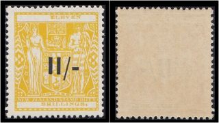Zealand 1942 Kgvi Fiscal 11/ - On 11s Yellow.  Sg F215.  Sc Ar97 photo