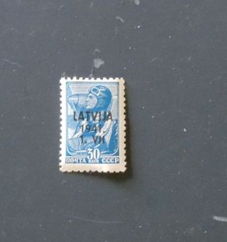 Russian Stamp.  30 Kopek.  Latvia 1941.  Blue With A Pilot And A Plane photo